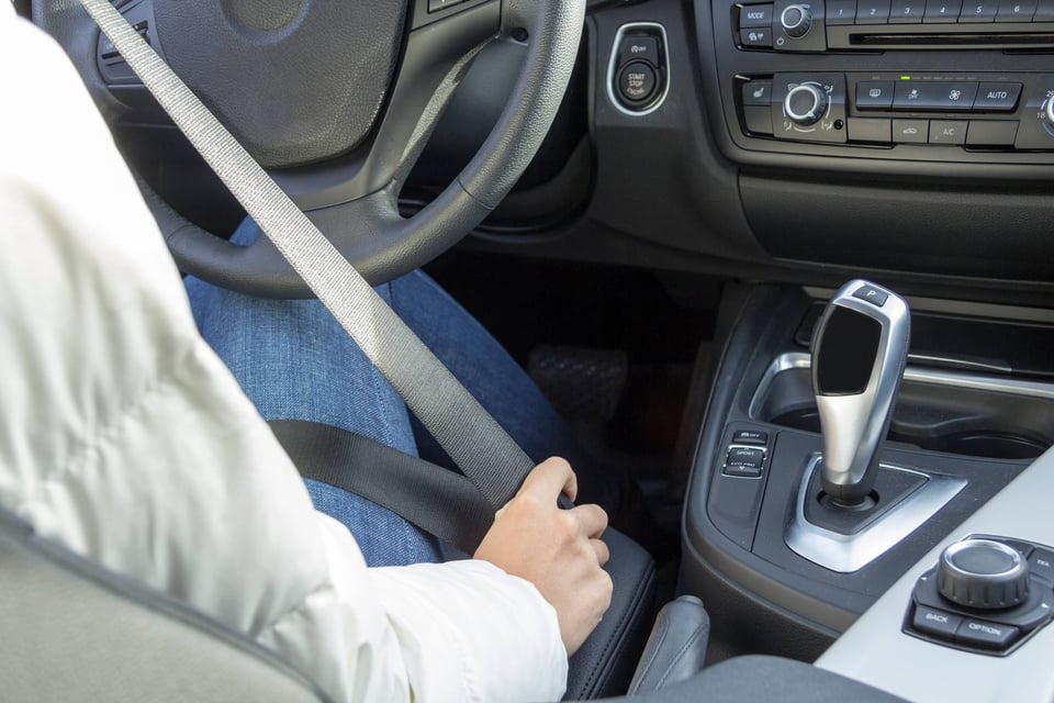 Fastening Seat Belt In Car